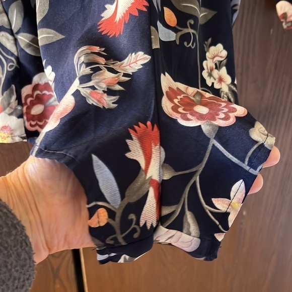 One❤️Clothing navy blue floral long sleeved romper. Size XS. Open V in the back. - Picture 3 of 14